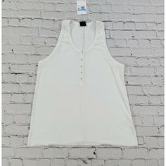 Nike Yoga White Henley Training Tank Top Cu5413-121 Womens Size Medium Brand New With Tags Unused Condition... 100% Authentic Womens Size Medium Approximated Measurements Taking Laying Flat Arm Pit To Arm Pit: 18" Length: 27" Hem: 22.5" We Buy Our Items As Overstock, Display Model, Open Box And Closeout. Products Are New But May Have Minor Cosmetic Issues Due To Storage Which Will Be In The Description. Most Of Our Items Will Have No Noticeable Issues. Poshmark Disclaimer: When In Doubt Check Ou Nike Relaxed Fit Top For Summer, Nike White Tops For Summer, Nike Casual Tank Top For Summer, Casual White Nike Tank Top, Nike Casual Cotton Tank Top, White Casual Nike Tank Top, White Athletic Fit Moisture-wicking Tank Top, Maroon Nike, Nike Stretch Moisture-wicking Tank Top