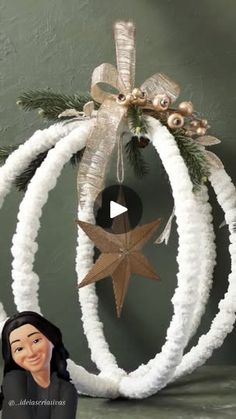 an ornament hanging from the side of a christmas tree with decorations on it