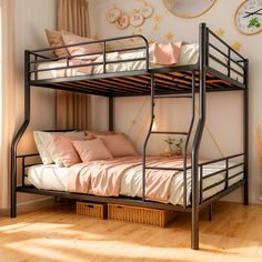 a bunk bed with pink sheets and pillows