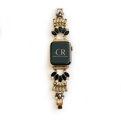 Dress up your everyday look with one of our custom-made jewelry watch bands! This is sure to be a gift that will please the girl who has everything or maybe just wants everything. This Multi-toned gold, black onyx and crystal statement bracelet Apple Watch Band is one of Copper Robin's best-selling bands. Available in Apple watch sizes 38mm, 40mm, 41mm, 42mm, 44mm, 45mm, 46mm, and 49mm It will fit all series of apple watches. Series 1-10 and SE. Available in Rose Gold, Gold, and Silver. Sizing: Luxury Adjustable Jewelry With Custom Hardware, Luxury Black Jewelry And Watches As Gifts, Elegant Metal Watch Bands As Gift, Timeless Adjustable Black Jewelry, Adjustable Metal Elegant Watch Bands, Timeless Black Jewelry And Watches For Gift, Elegant Metal Apple Watch Band Fashion Accessory, Luxury Black Band Jewelry Gift, Handmade Black Watch Accessories For Gift