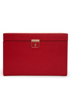 a red leather box with gold handles