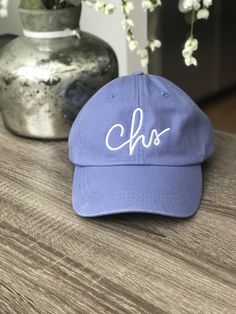 Our NEWEST addition to the Hometown line! Handwritten CHS relaxed fit hat with a gorgeous leather adjustable strap and gold detail on the back. Perfect for those sunny summer days while you're lounging at the beach or pool, preferably with one of our CHS tumblers in-hand ;) In stock and ready to ship now! Adjustable Green Baseball Cap For Everyday Summer Use, Adjustable Curved Visor Dad Hat For Summer, Summer Curved Visor Adjustable Dad Hat, Summer Adjustable Dad Hat With Curved Visor, Summer Adjustable Curved Visor Dad Hat, Adjustable Summer Dad Hat With Curved Visor, Summer Dad Hat With Adjustable Curved Brim, Adjustable Curved Visor Baseball Cap For Vacation, Summer Dad Hat With Curved Brim And Adjustable Fit