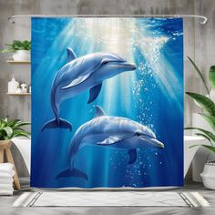 two dolphins swimming in the ocean shower curtain set