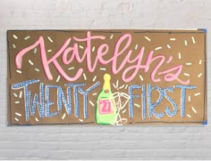 a sign on the wall that says katelyn's twenty first with sprinkles