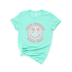 Looking for a cute versatile top to wear this summer? Make sure to grab one of our Hello Sunshine Leopard Smiley Face tees! This soft and comfortable graphic tee is the perfect top for any outfit. It can be paired with biker shorts, jeans, or even a simple skirt/dress! This tee is true-to-size, so be sure to order your regular t-shirt size! If you are looking for a more oversized look, make sure to size up! Smiley Face Tee, Hello Sunshine, Biker Shorts, Smiley Face, Cute Tops, Smiley, Dress Skirt, Graphic Tee, Top Shirt