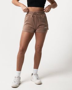 Lightweight High waisted elasticized waistband with drawstring side pockets Ultra-plush material Shape retaining Tonal eyelets Cotton / Polyester / Elastane Introducing, your new favourite sweat shorts! Stylish, comfortable and flattering, our new Balance Women's Shorts are designed to be your ideal short. These shorts are versatile and can be worn in many settings, including the gym, errands, during sports or hanging at the beach or park! Pockets provide convenience and the elasticized waistban New Balance Women, Sweat Shorts, The Gym, At The Beach, Women's Shorts, New Balance, The Beach, High Waisted, Gym