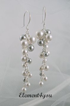 Bridal Earrings. Long pearl clusters earrings by Element4you Silver Dangle Cluster Earrings With Pearl Drop, White Pearl Drop Cluster Earrings For Anniversary, Silver Pearl Cluster Earrings For Anniversary, White Cluster Earrings With Pearl Drop For Party, Silver Pearl Earrings For Mother Of The Bride, Silver Chandelier Earrings With Pearl Charm For Wedding, Silver Pearl Chandelier Earrings For Anniversary, White Pearl Drop Dangle Cluster Earrings, Pearl White Cluster Earrings For Wedding