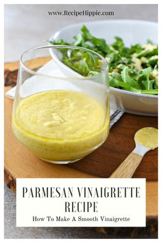 parmesan vinaigrette recipe in a glass bowl next to a salad on a cutting board