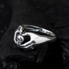 The classic Irish ring, love, embrace, and crown. When one day the crown recedes and things change, can you still recognize her/him? This hugging skull ring combines hugging and skull elements, time flies, cherish the present, and these will become eternal. You can think of this skull ring as a warning ring, or you can think of this skull ring as "the sea withers and the rocks crumble, my heart is eternal, embracing you!"Weight: 3.91 gWidth: 2.6 mmHeight: 6.3 mmThickness: 1.1 mmMaterial: Plating Symbolic Skull Ring For Anniversary, Symbolic Sterling Silver Skull Ring, Adjustable Round Skull Ring For Anniversary, Adjustable Skull Ring For Anniversary, Irish Ring, Irish Rings, Things Change, Time Flies, Skull Ring