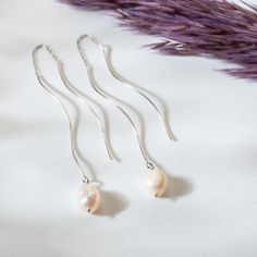 What do pearls mean to a woman? Traditionally, pearls have represented concepts like love, purity, and wisdom. If someone gives you a pearl, they probably care about you very much and want to express their love in a unique and timeless way. • Material: High Quality Solid 925 Sterling Silver• Finish: Sterling Silver / Rose Gold / Gold• It's dainty and can be worn every day• A special piece you'll treasure• High quality materials and attention to detail• Our jewelry is designed With 🖤️ In NYH O W Elegant Spiral Earrings As Gift, Elegant Rose Gold Wire Wrapped Earrings, Elegant Spiral Jewelry For Gifts, Modern Twist Teardrop Earrings Gift, Teardrop Earrings With A Modern Twist As A Gift, Elegant Pink Earrings For Everyday Wear, Pink Elegant Everyday Earrings, Elegant Pink Everyday Earrings, Elegant Long Drop Hypoallergenic Threader Earrings