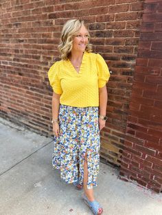 Expertly crafted with a vibrant yellow hue, our Yellow Ruffle V-Neck Top adds a pop of color to any outfit. Made from high-quality materials, this top is both stylish and durable, making it a must-have in your wardrobe. Elevate your look with this versatile and chic piece. Yellow V-neck Blouse For Spring, Chic Mustard Tops For Spring, Chic Yellow Blouse For Day Out, Casual Mustard V-neck Blouse, Mustard Tops For Spring Brunch, Mustard Tops For Brunch In Spring, Mustard Blouse For Spring Brunch, Yellow V-neck Blouse For Brunch, Yellow V-neck Tops For Work