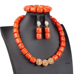 African Beaded Jewelry Set is a style inspiration. Indulge in the epitome of elegance with our Classy Women’s Jewelry Set. This set is a vibrant celebration of African culture, featuring beautifully handcrafted pieces that are sure to turn heads and elevate your style. Designed for the fashionable woman, this set includes a stylish necklace, trendy beaded bracelet, and chic beaded earrings, all coordinated to offer a seamless look. Exquisite Craftsmanship Each piece in this set is crafted with high-quality zinc alloy and resin, ensuring durability while maintaining a lightweight feel. The trendy beads are arranged in a captivating plant pattern, embodying both the beauty of nature and the pinnacle of fashion. Available in six stunning colors, this jewelry set offers versatility and style. Elegant Orange Beaded Necklaces With Spacer Beads, Elegant Orange Polished Beads Jewelry, Elegant Orange Necklace With Spacer Beads, Elegant Orange Beaded Necklace With Spacer Beads, Elegant Orange Jewelry With Polished Beads, Elegant Red Beaded Jewelry Set, Elegant Orange Jewelry With Faceted Beads, Orange Round Beads Jewelry For Party, Elegant Handmade Beads For Festivals