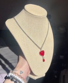 This beautiful handmade piece is a stainless steel necklace made with a glass heart and glass teardrop bead. It's a beautiful simple piece perfect for any look.  This necklace is 16 inches and adjustable to 21 inches. The extension has extra length for an elevated look.  All findings and chains and wire is stainless steel. Red glass beads were used.  *Ships 3-5 Days Necklace Grunge, Teardrop Beads, Glass Heart, Steel Necklace, Stainless Steel Necklace, Red Glass, Pendant Necklaces, Favorite Jewelry, Jewelry Necklace Pendant