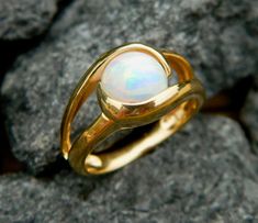 18k Gold Plated (over .925 sterling silver) interchangeable ring with a 8mm synthetic white opal. The stone can be changed by simply pushing the stone out the bottom and replacing it with any other 8mm stone or marble. Modern Round Opal Jewelry, Modern Round Opal Ring, Marble Rings, Black Onyx Stone, Pretty Rings, Onyx Stone, Multi Stone Ring, White Opal, Stone Rings