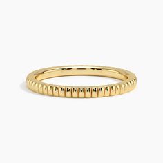 Jade Trau Esthética Wedding Ring - 18K Yellow Gold. Soft fluted forms oscillate across the surface of this modern band adding a hint of architectural flair to a timeless, romantic design. Pair with satin finish or diamond-accented bands to create a personalized and chic stack. 
 
 Jade Trau adds a signature spin on classic diamond staples, crafting designs timeless enough to evolve with you and unique enough to make a statement. Elegant Wedding Jewelry With Fluted Bezel, Elegant Wedding Watch With Fluted Bezel, Yellow Gold Jewelry With Fluted Bezel For Wedding, Wedding Jewelry Yellow Gold With Fluted Bezel, Yellow Gold Fluted Bezel Wedding Jewelry, Yellow Gold Wedding Jewelry With Fluted Bezel, Gold Rings With Fluted Bezel For Wedding, Gold Wedding Rings With Fluted Bezel, Elegant Gold Rings With Fluted Bezel