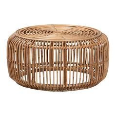 a round wicker coffee table on white background