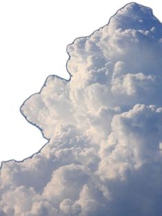 an airplane flying through the clouds in the sky