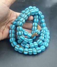 Antique Old Naga Hill Tribe Turquoise Blue Tone GLASS Ethnic bead Necklace strand For Create Jewelry collectible Great condition! Bead size : 6mm Length : 22 inches Bohemian Turquoise Beaded Necklaces, Bohemian Turquoise Beaded Necklace, Bohemian Blue Beaded Bracelets With Wooden Beads, Blue Bohemian Beaded Bracelets With Wooden Beads, Blue Wooden Beads For Festival, Traditional Blue Turquoise Necklace For Festivals, Traditional Blue Jewelry With Wooden Beads, Blue Hand-strung Bohemian Beaded Necklaces, Bohemian Blue Hand-strung Beaded Necklaces