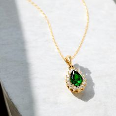 Pear Emerald Necklace with makes the perfect gift from the heart that shows you care, offering protection and affection. You can combine the dainty gemstone pendant with a personalized touch, add the birthstones of your family members or choose stones that align with your spirit. 💜 Details Width 8.79 mm Lenght 10.90 mm Thickness 5.3 mm 💟 Use the ''Personalization'' to let us your birthstones that you desire to be on your necklace. You can choose them from our birthstone. Please write your desi Pear-shaped May Birthstone Necklace Gift, Pear-shaped Gemstone Jewelry As Gift, Pear-shaped Gemstone Accent Jewelry Gift, Elegant May Birthstone Necklace As Gift For Mom, Elegant Birthstone Necklace Gemstone As Gift For Mom, Pear-shaped Gemstone Necklace For May Birthstone, Elegant Necklace With May Birthstone For Mom, Elegant Birthstone Necklace With Gemstone As Gift For Mom, Pear-shaped May Birthstone Gemstone Necklace