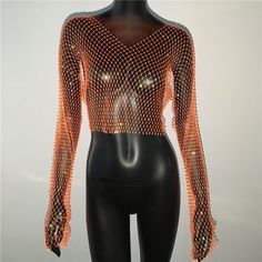 Rhinestone Fishnet Mesh Crop Top Elevate your style with our dazzling Rhinestone Fishnet Mesh Crop Top! This long-sleeve, see-through T-shirt is perfect for beach cover-ups, party nights, and clubbing. Its sexy and shiny design adds a touch of glamour to any outfit. Stand out in the crowd and make a bold fashion statement with this alluring tank top. SPECIFICATIONS Tops Type: Tees Style: Sexy & Club Sleeve Style: Regular Sleeve Length(cm): Full Season: All season Place Of Origin: China (Mainland Fishnet Mesh Top For Summer Parties, Stretch V-neck Mesh Top For Party, Summer Party Mesh Top With Fishnet Details, Fishnet Party Tops For Spring, Summer Party Fishnet Mesh Top, Spring Party Fishnet Tops, Long Sleeve Fishnet Top For Party, Summer Party Long Sleeve Mesh Top, Trendy Long Sleeve Fishnet Mesh Top