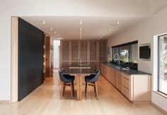 the kitchen is clean and ready to be used as a dining room or living room