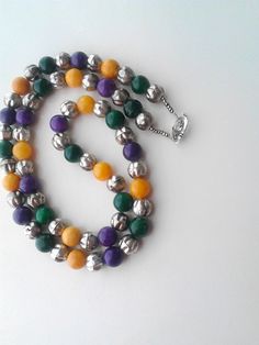 More beaded necklaces : https://www.etsy.com/shop/PlexisArt?ref=seller-platform-mcnav§ion_id=22155194 The perfect accessory for every occasion and every season This long necklace is handmade with jade stones in three match colors and brass silver beads between them. The necklace is 30 inches long. The jade stones are 12mm. Since these stones are all natural stones, it is expected that they are unique and slightly different for each necklace Jade Nephriteis the zodiac stone of Libra. Metaphysical Multicolor Beaded Jade Necklaces, Multicolor Jade Round Bead Necklaces, Multicolor Jade Beaded Necklaces With Round Beads, Multicolor Jade Beaded Necklaces, Multicolor Beaded Jade Necklace, Multicolor Jade Jewelry With Colorful Beads, Multicolor Jade Beaded Jewelry, Long Bead Necklace, Ombre Necklace