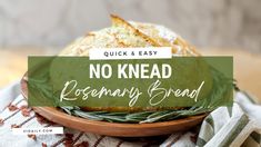 a bowl filled with bread sitting on top of a table next to a white and green napkin