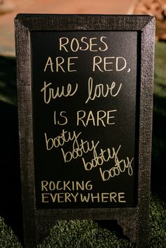 a sign that says roses are red, true love is rare, rocky bottomy body by everything everywhere