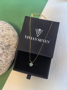 🌟 Introducing the opulent Opal Heart Pendant Necklace by Vivian Seven. Handmade with precision, this exquisite piece features a lustrous 18k gold-plated stainless steel chain link and a captivating teal opal embedded in the pendant. Elevate your jewelry collection with this exclusive women's piece. * Stainless Steel, titanium steel, opal stone * 18k gold plate * 16 3/4" (42.5cm) length, 2"(5cm) extender * 3/8" (1cm) pendant * Lobster clasp closure 🌟 Helpful info: Protect your precious jewelry Gold Plate Necklace, Chic Necklace, Plate Necklace, Heart Chain, Opal Stone, Precious Jewelry, Gold Plated Necklace, Delicate Necklace, Dainty Necklace