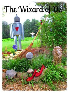 the wizard of oz garden with red shoes and broom