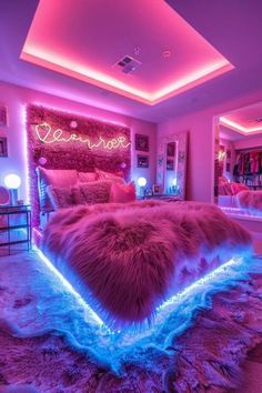 a bedroom with pink and blue lights on the walls, fur rugs and bedding