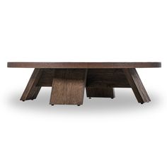 a wooden table with two intersecting legs on the top and bottom, in dark wood