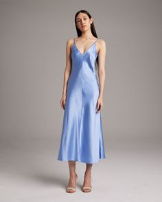 This elegant bias-cut slip dress features a spaghetti strap and flattering V Neck for a fresh, yet refined look. This perfect basic can be worn for life, dressed up, or dressed down, for the perfect effortless ensemble. 100% Silk Charmeuse Made in New York City Product Care: Dry Clean Only V Neck Silk Dress, Nylon Dress, Silk Slip Dress, Church Decor, Silk Charmeuse, Silk Slip, Kaftan Dress, Peasant Blouse, Engineered Garments