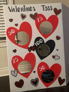 a cardboard valentine's day card with cut out hearts