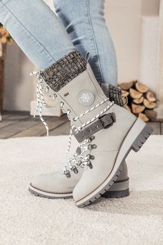 Combat the cold with these snow-ready boots equipped with cozy ribbed cuffs and chic buckled straps. 1.72'' heel 12.6'' circumference 11.8" Shaft Zip closure Man-made upper Man-made lining Man-made footbed Man-made midsole Rubber sole Half Boots, Boot Straps, Outdoor Shoes, Winter Shoes, Boots For Sale, Timberland Boots, Comfortable Fashion, Biker Boot, Snow Boots