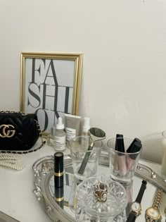 the vanity is filled with cosmetics and personal care items