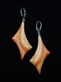 The earrings are one of a kind,  handmade from Flame Boxelder wood and have very smooth and brilliant surface.  It is very light earrings. Leverbacks are Rhodium plated. Care instructions: Avoid direct contact with perfumes, alcohol, water and other solvents that may damage wood finish. Wipe jewelry with soft dry cloth. Teardrop Wood Earrings For Gifts, Wooden Teardrop Earrings As Gift, Wooden Teardrop Earrings For Gift, Teardrop Wooden Earrings For Gifts, Teardrop Wood Jewelry Gift, Natural Wood Drop Earrings, Unique Natural Wood Earrings, Wooden Jewelry With Matching Earrings As Gift, Wooden Jewelry With Matching Earrings For Gift