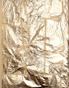 a piece of tin foil that has been cut into squares