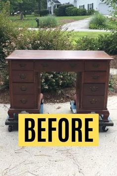 an old desk with the words before and after painted on it in front of some bushes