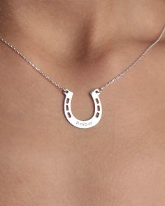 💎We have prepared a special jewelry for horse lovers out of 14k gold or 925 silver.      💎  You can always carry it with you by printing your horse's name on it.   💎 If you want, wear your horse love as a necklace by printing your own name. It is also a great gift for your loved ones.  💎 The best gift, especially for those who are in love with their horses. We wrap it as gift wrap for you.  💎  A great chirtsmas gift. It's also a nice gift for your daughter, nephew, son, brother. 💎 If you w Horseshoe Shaped Engraved Jewelry Gift, Engraved Horseshoe Jewelry Gift, Engraved Horseshoe Jewelry For Gift, Personalized Horseshoe Necklace For Gift, Personalized Silver Horseshoe Jewelry, Wedding Ring Holder Necklace, Ring Holder Necklace, Shoes Names, Horseshoe Ring