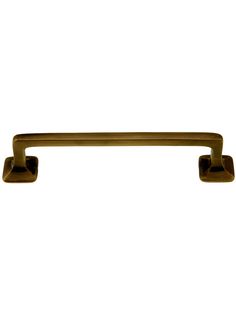 an antique brass pull handle on a white background