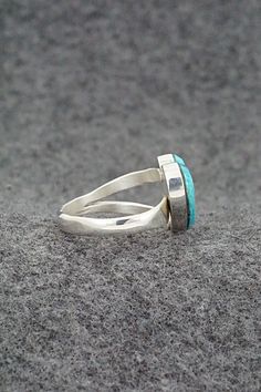 This turquoise, onyx, opalite and sterling silver inlay ring was made by Navajo silversmith Michelle Willie. The inside of the band is signed and stamped .925.Size: 8 adjustableLength: 1/2"Width: 5/8"Free shipping on all orders! We ship with USPS and always include tracking. All orders ship within a day of payment.Returns are accepted up to 30 days after you receive your order. Just send us a message. Our shop offers cash back or store credit. The item must be returned in the same condition. Bear Carving, Pearl Chain, Multi Stone, Native American Jewelry, Free Jewelry, Sterling Silver Ring, White Vintage, Silver Ring, Sterling Silver Rings