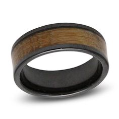 a black ceramic ring with wood in the center