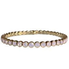 This gorgeous bangle features beautiful Swarovski pink opal crystals. With its flexible closure, they are perfect for any wrist size. A great way to add a statement piece to your wardrobe. Swarovski Crystals 4mm stones Brass 14K Gold Plate Bean Jewelry, Opal Bangle, Bracelet Collection, Opal Crystal, Pink Opal, Charm Earrings, The Pink, Shop Necklaces, Chain Bracelet