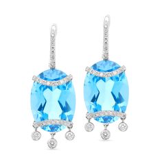 Make a statement with our oval cut blue London topaz and diamond dangle earrings. each elegant chandelier-style earring showcases a 15ct oval-cut blue London topaz. The bottom and top of the gemstone are wrapped by two embellished ribbons accentuating the oval shape. Three round-shaped dangles suspended from the bottom ribbon for extra sparkle and detailing. Radiant with 31ct. t.w. of diamonds and a bright polished shine, these spectacular chandelier drops susp Blue Oval Earrings With Diamond Accents, Modern Oval Blue Earrings, Modern Blue Oval Earrings, Blue Topaz Oval Earrings, Blue Oval Topaz Earrings, Luxury Oval Blue Topaz Earrings, Luxury Blue Topaz Earrings With Diamond Accents, Luxury Light Blue Topaz Earrings, Luxury Brilliant Cut Blue Topaz Earrings