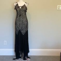 Sleek Black Haute Hippy Maxi Gown. Sleeveless. Floor Length. Fully Lined. Hidden Back Zipper. Nylon. Brand New. Never Worn. Pristine Condition. Measurements Are Laid Flat: Chest: 15 Waist: 14 Hip: 16 Lenght: 64 Refer To Photo’s For Details As Part Of Description. Smoke Free Home Fitted Sleeveless Maxi Dress For Evening, Fitted Sleeveless Lace Maxi Dress, Elegant Sleeveless Lace Gown, Glamorous Sleeveless Lace Evening Dress, Sleeveless Lace Maxi Dress For Gala, Lace Bias-cut Maxi Dress For Evening, Fitted Sleeveless Evening Gown, Fitted Sleeveless Flapper Dress For Gala, Black Sleeveless Cocktail Gown