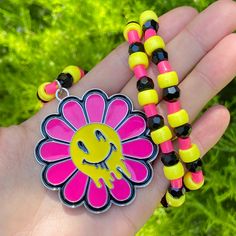 Flower charm is made from metal Trendy Flower Necklace With Flower Charm Pendant, Trendy Flower Pendant Necklace With Charm, Trendy Flower Necklace With Flower Pendant, Retro Yellow Flower Jewelry, Yellow Flower-shaped Retro Jewelry, Retro Yellow Flower-shaped Jewelry, Retro Multicolor Flower Jewelry, Kandi Necklace, Beaded Necklaces