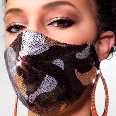 Being safe has never looked so good.  Slow the spread with a fabric while staying stylish in a camouflage sequin face mask by Braazi. Our face masks are true designer quality.  This luxury bling face mask is hand-made in our Maryland studio with meticulous attention to every detail.  Each mask in our designer collection looks elegant and luxurious while also being breathable, lightweight and comfortable enough for all-day wear. LIMITED EDITION! We have a very limited amount of the beautiful, sof Luxury Face Mask, Face Masque, Mask Types, Large Sequins, Skin Line, Mask Fashion, Face Mask Fashion, Mouth Mask, Dust Mask