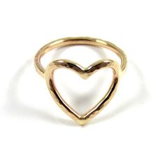 Gold Heart Ring~ Send a gift of love, let your loved one know they are loved with this sweet heart ring. Custom made for you, each ring is hand forged with 14k gold fill and hammered and polished to a beautiful shine. Great gift for the sweetheart in your life! *This listing is for 1 14k gold fill heart ring made with 14 gauge wire.* **Each ring is a one of a kind, hand shaped and hammered and will vary.** Also available in sterling silver~ https://www.etsy.com/listing/119635194/silver-heart-rin Rose Gold Heart Ring Valentine's Day Gift, Heart Cut Ring For Valentine's Day Gift, Adjustable Heart Ring For Wedding On Valentine's Day, Adjustable Heart Ring For Valentine's Wedding, Rose Gold Heart Ring For Gift, Rose Gold Open Heart Wedding Ring, Gold Heart Ring For Wedding And Mother's Day, Delicate Adjustable Heart Ring For Valentine's Day, Gold Open Heart Ring For Wedding