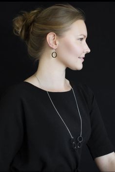 Designer: Elina Mäntylä. Description: Luna necklace has made of Finnish birch. The metal chain is nickel-free jewellery metal. The chain is adjustable. Elegant and modern necklace for everyday use or festive occasions. Pair with Luna or Halo Earrings. Color: Wood. Handmade in Finland. Valona is a Finnish award-winning design company led by designer Elina Mantyla. Valona's style is minimalistic and elegant, yet stays true to its roots in the Nordic nature and traditions. Valona means "as light" i Elegant Everyday Nickel Free Necklace, Elegant Everyday Nickel-free Necklace, Metal Long Necklace With Round Pendant As Gift, Modern Nickel-free Chain Necklace For Gift, Metal Long Necklace With Adjustable Chain As Gift, Modern Metal Jewelry With Adjustable Length, Nickel-free Metal Necklaces For Everyday, Modern Charm Necklace With Round Pendant And Adjustable Chain, Modern Charm Necklace With Adjustable Chain And Round Pendant